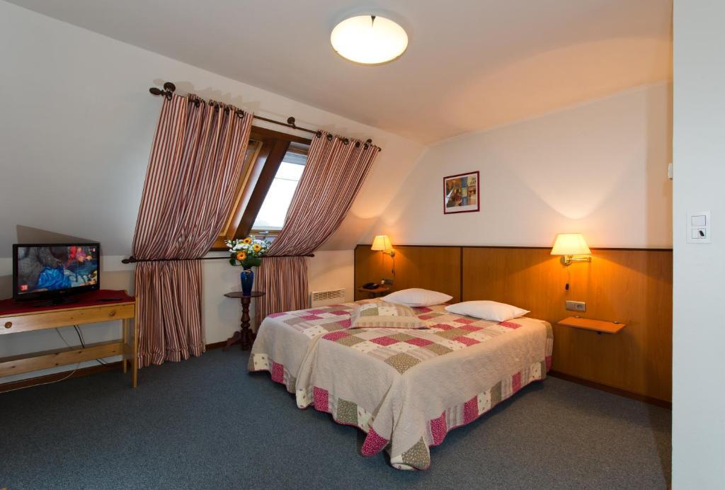 Auberge Le XIX Eme Thulin Cameră foto